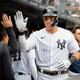Aaron Judge #99 of the New York Yankees celebrates his fourth inning home run during game one of a doubleheader against the Minnesota Twins in the dugout with his teammates at Yankee Stadium on September 07, 2022 in the Bronx borough of New York City.
